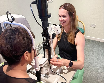 The optical studio - Godalming storee, doctor is checking the patient