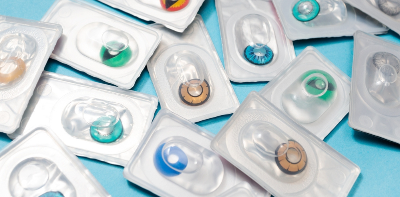 Blister packs of bright coloured contact lenses for Halloween.